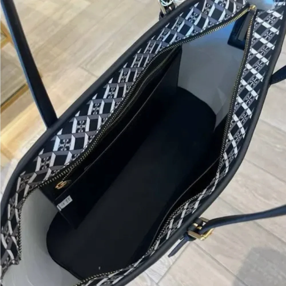 Gently used Tory Burch 143364 Geo Logo Top Zip Tote Black Shoulder Bag $398 - Picture 2 of 3